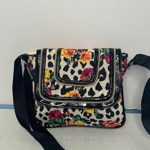 Betsey Johnson crossbody in leopard spots and roses print